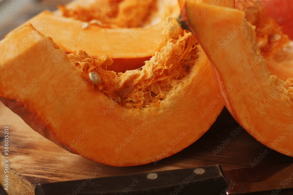 Fresh ripe pumpkin on a wooden table Fresh ripe pumpkin on a wooden table