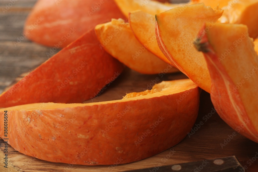 Fresh ripe pumpkin on a wooden table Fresh ripe pumpkin on a wooden table
