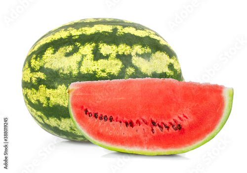 whole green round watermelon and cut piece of watermelon isolated on white background