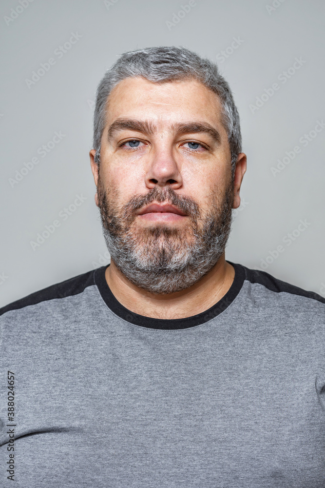 Fototapeta premium portrait of a gray-haired man 40-50 years old with a beard