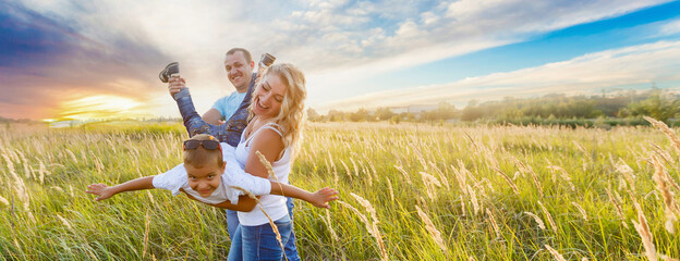 happy family in spikelet field.
