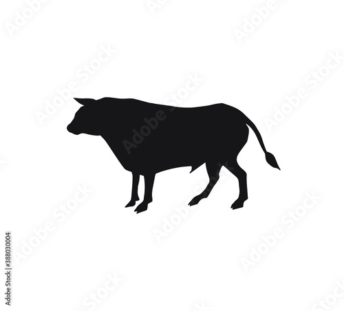 Vector hand drawn standing bull silhouette isolated on white background