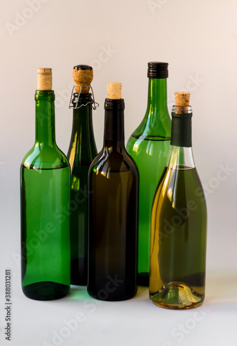 A group of alcoholic bottles on white surface,vertical images