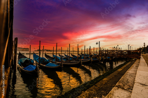 Gondolas of Venice in the morning light. Italy. photo