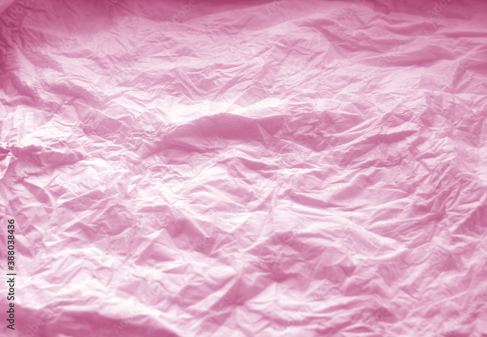 Crumpled paper background in pink color. Crumpled paper background in pink color.