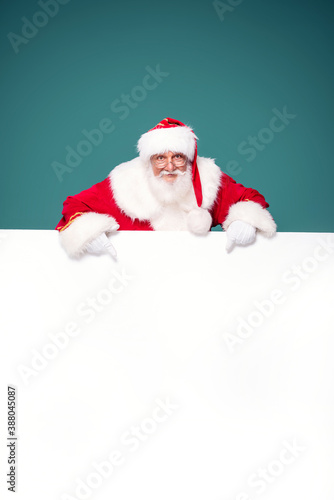 Real Santa Claus showing white empty board.