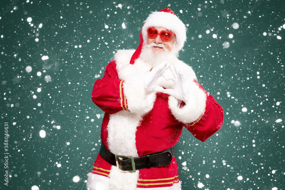 Santa Claus showing heart symbol. Santa Claus showing heart symbol.