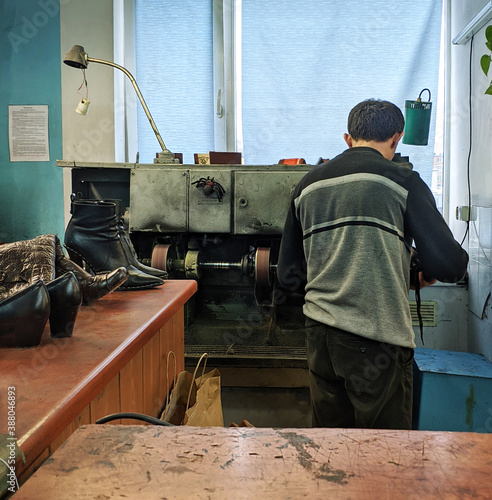 manual labor in a shoe repair shop