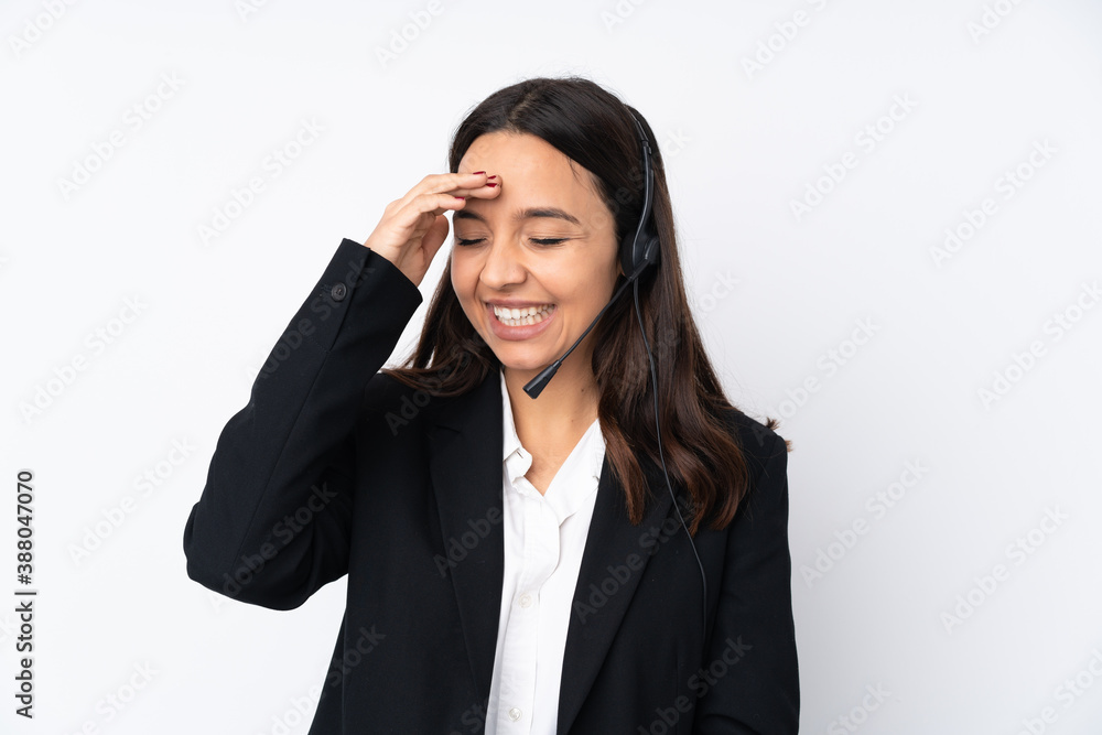 Young telemarketer woman isolated on white background smiling a lot Young telemarketer woman isolated on white background smiling a lot