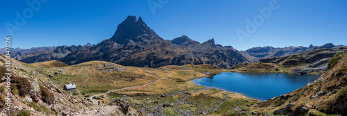 Pic du Midi Ossau mountain and Lac Gentau lake in the french Pyrenees mountains, Pyrenees National Park, France © nomadkate