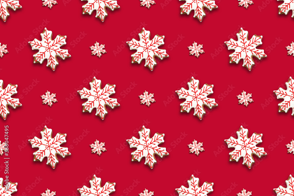 Seamless pattern of Christmas gingerbread in shape snowflake on red. Xmas abstract background. Seamless pattern of Christmas gingerbread in shape snowflake on red. Xmas abstract background.