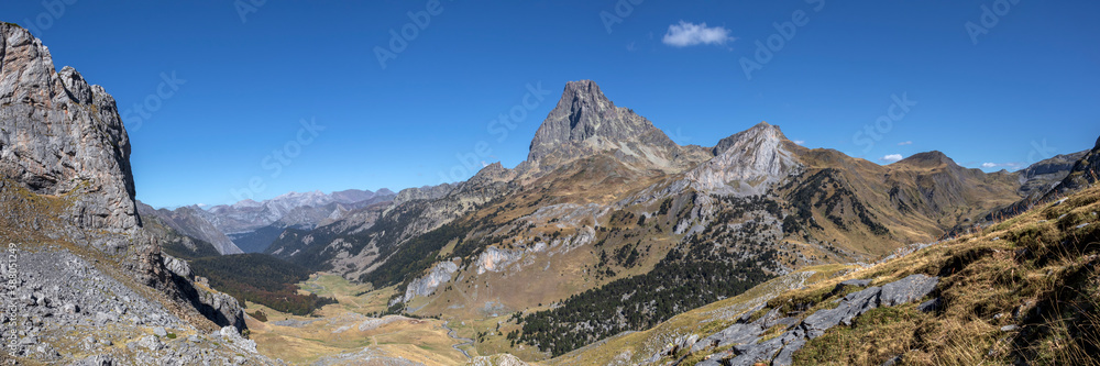 Panorama of Ossau Valley with Pic du Midi d'Ossau mountain, Pyrenees National Park, France Panorama of Ossau Valley with Pic du Midi d'Ossau mountain, Pyrenees National Park, France