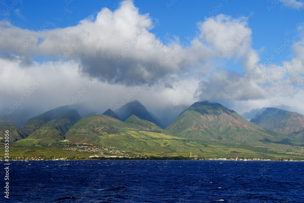 Steep gulches of west Maui mountains at Lahaina from the sea
