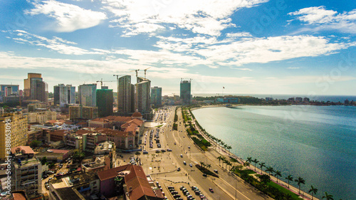 Road, lights and sea at night.
Luanda city captured from the top