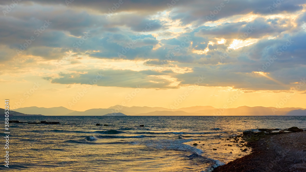 Seascape with the sea and islands at sunset Seascape with the sea and islands at sunset
