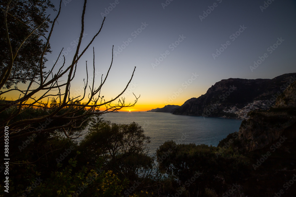 wonderful ultra wide panorama, at sunset among the luxuriant vegetation of the Mediterranean scrub, in Italy on the Amalfi coast