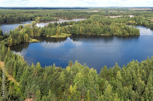 Forest lake from a height in the taiga