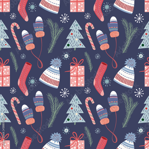 Christmas seamless pattern with cute elements, cozy clothes, candies, pine branches and gift boxes, seasonal winter design