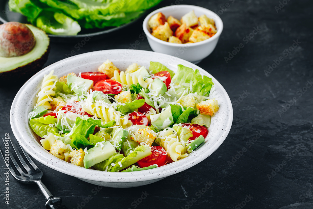 Caesar Pasta Salad with avocado, croutons and tomatoes Caesar Pasta Salad with avocado, croutons and tomatoes