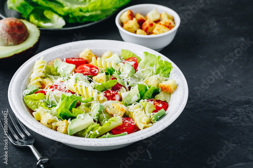 Caesar Pasta Salad with avocado, croutons and tomatoes