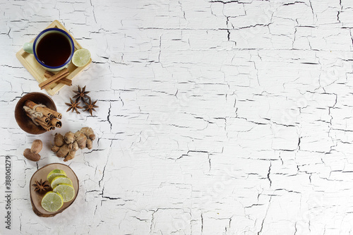 herb and spices on white cracked table