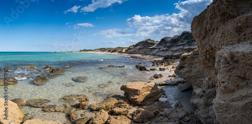 Fototapeta Naklejka Na Ścianę i Meble -  Beach hike to the Torre Guaceto in Apulia, Italy through the maritime nature reserve