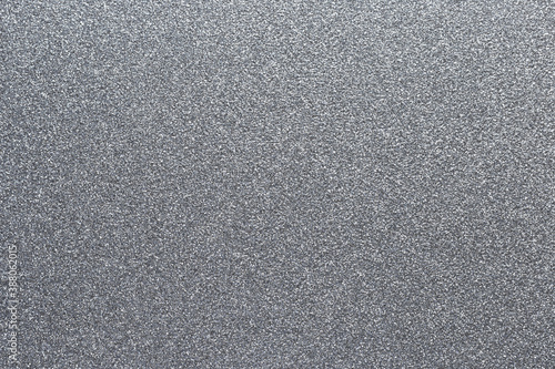 Silver glitter bokeh background. Sparkling texture. Perfect for backdrop for your design. Copy space.