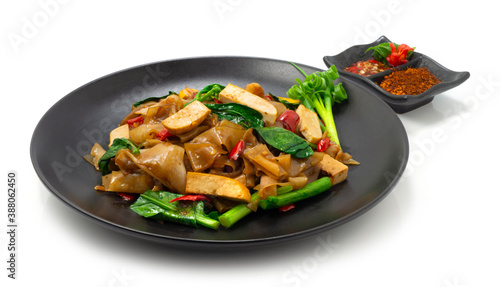 Spicy stir fried flat noodle with Tofu Vegetarian Chinese Style