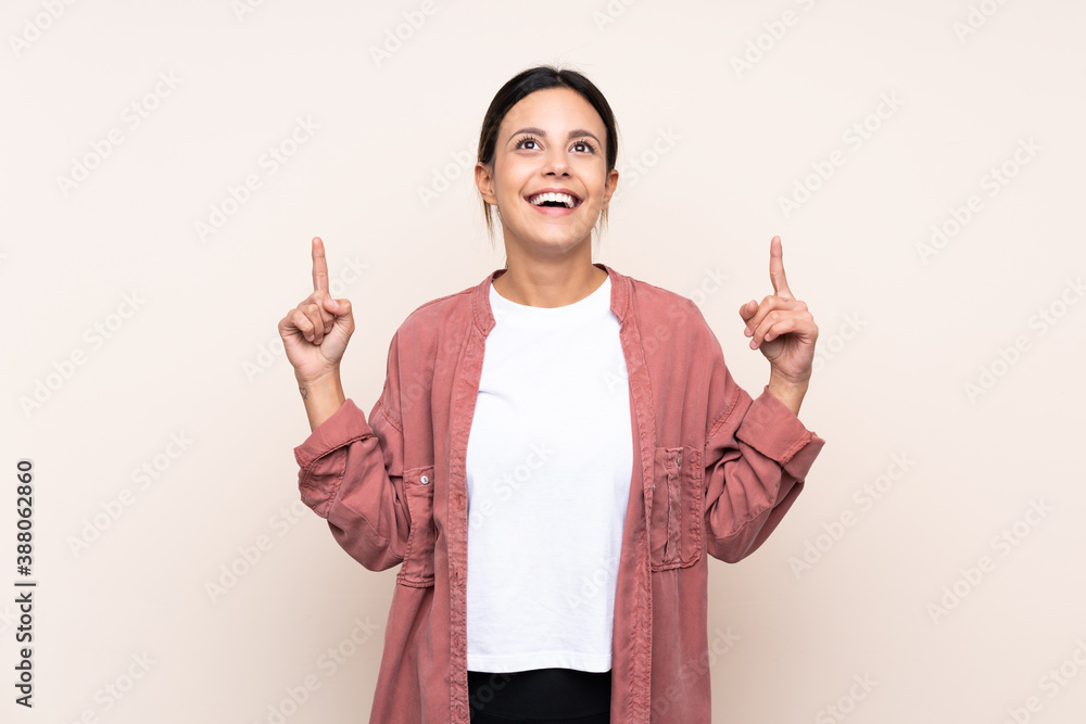 Woman over isolated background pointing up a great idea Woman over isolated background pointing up a great idea