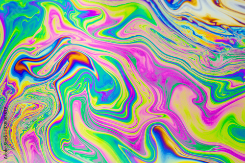 Psychedelic multicolored patterns background. Photo macro shot of soap bubbles