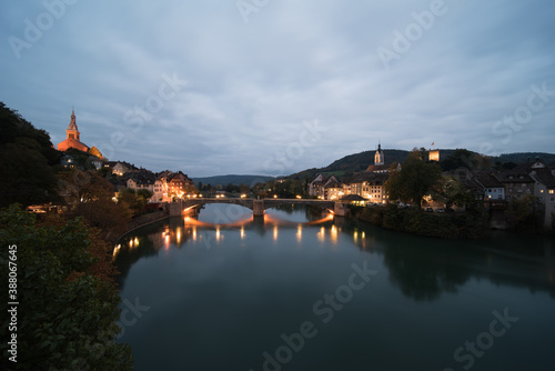 the historical old town of Laufenburg on the rhine river,  which forms the border between germany and switzerland. photo