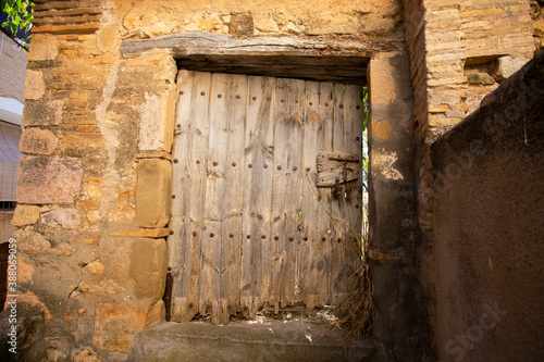 Old wood door from a medieval town in Spain.