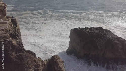 Aerial view of rock formation along the wild coastline near Nazarֳ¨ lighthouse, Portugal.