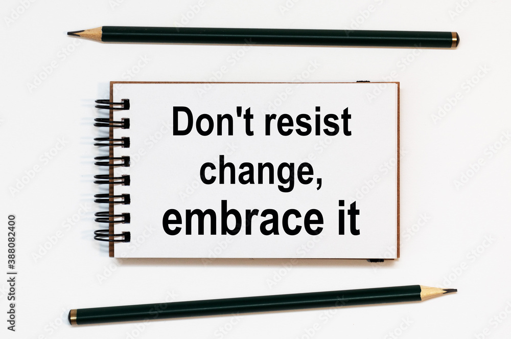 WHITE SPIRAL NOTEBOOK, TWO PENCILS WITH TEXT Don't resist change, embrace it WHITE SPIRAL NOTEBOOK, TWO PENCILS WITH TEXT Don't resist change, embrace it