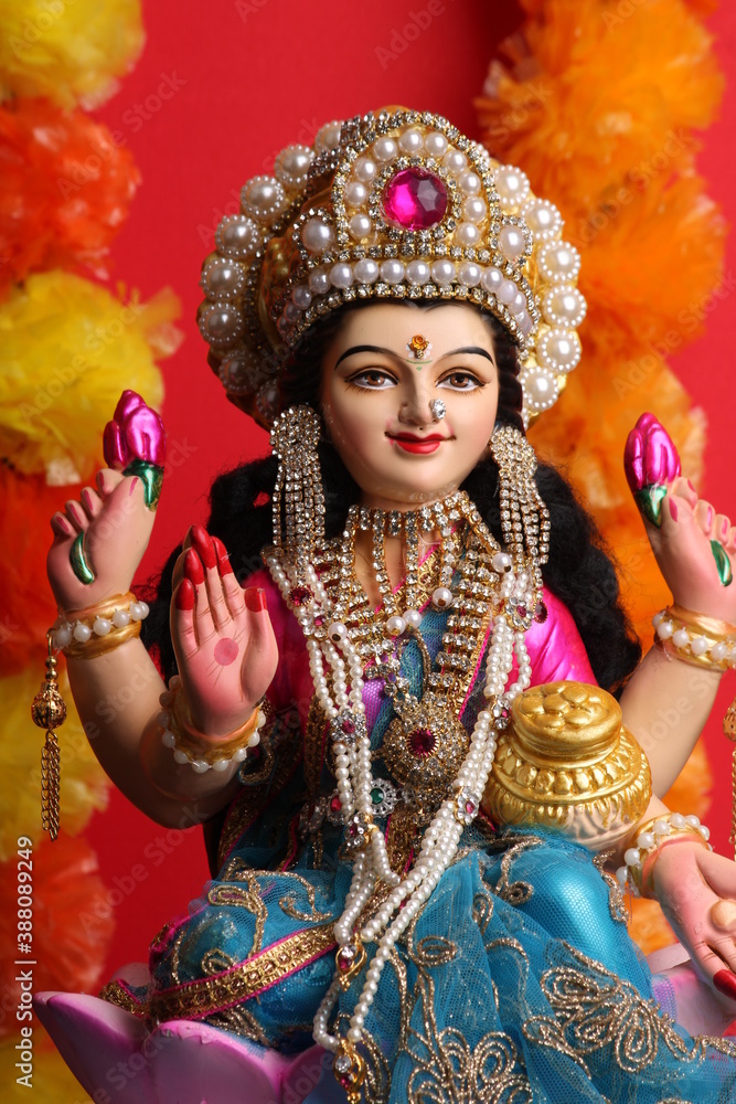 Idol worshipping of Hindu Goddess Lakshmi - Lakshmi Puja is a Hindu religious festival Idol worshipping of Hindu Goddess Lakshmi - Lakshmi Puja is a Hindu religious festival