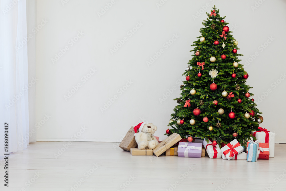 Fototapeta premium Christmas tree pine with gifts for the new year decor background place for inscription