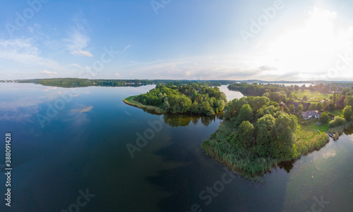 Aerial view of a lake Dieksee with forest and blue sky