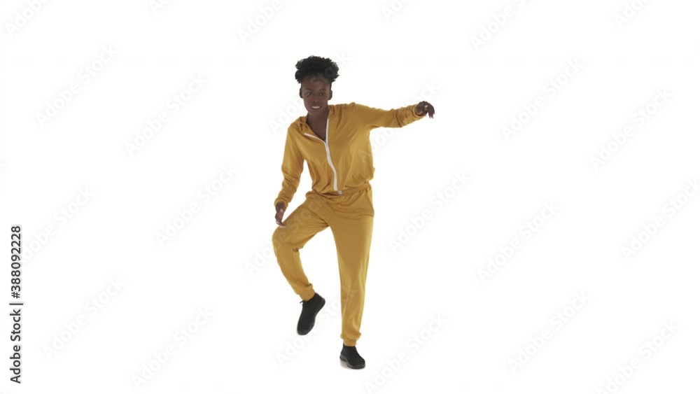 African American woman dancing shuffle. Dancer shaking upper body, stepping in and out, raising legs, pushing knees and stomping. Street dance improvisation. Isolated on white background African American woman dancing shuffle. Dancer shaking upper body, stepping in and out, raising legs, pushing knees and stomping. Street dance improvisation. Isolated on white background