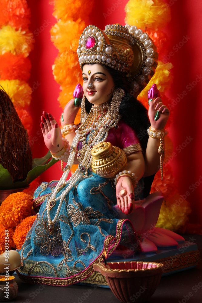 Lakshmi pujan - godess laxmi idol with Copper Kalash and coconut  