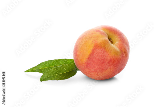Delicious ripe juicy peach with leaves isolated on white