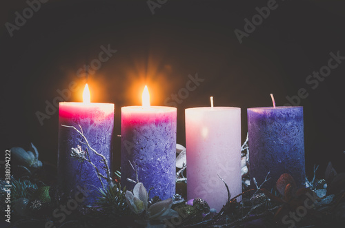 advent decoration with two burning candles photo