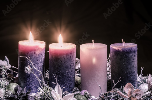 advent decoration with two burning candles