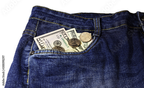 Paper money American dollars and cents in blue jeans pocket isolated on white background