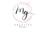 Handwritten MG M G letter logo with sparkling circles with pink glitter.