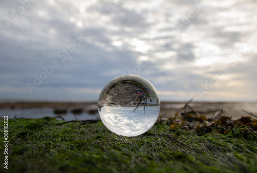 Through a lens ball at Bembridge beach, Isle of Wight, England photo