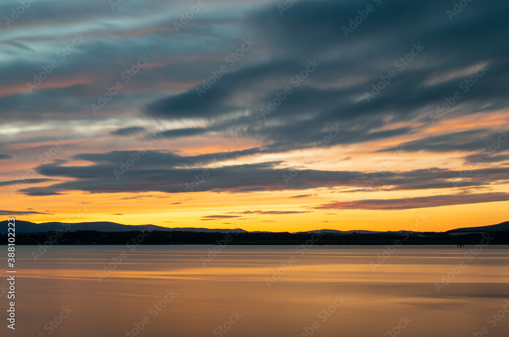 sunset blur reflection colorful sky clouds landscape