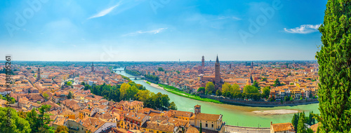Photos Panorama of Verona historical city centre, bridges across Adige river, Basilica di Santa Anastasia, medieval buildings with red tiled roofs, Veneto Region, Italy