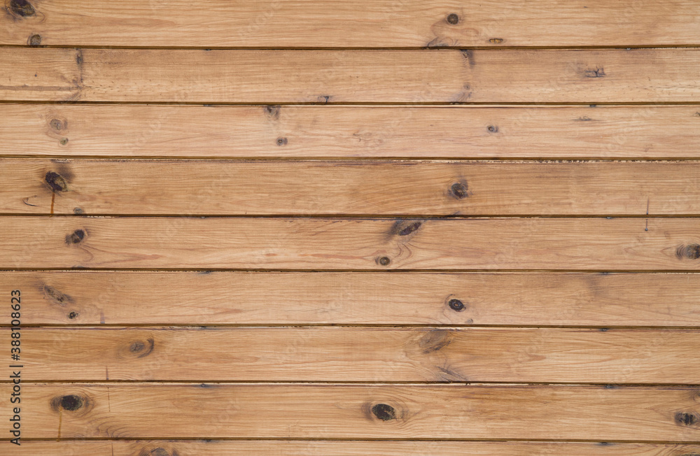 Fototapeta premium New wooden wall closeup