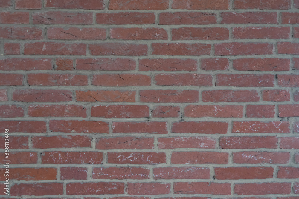 Background of old red exposed brickwork