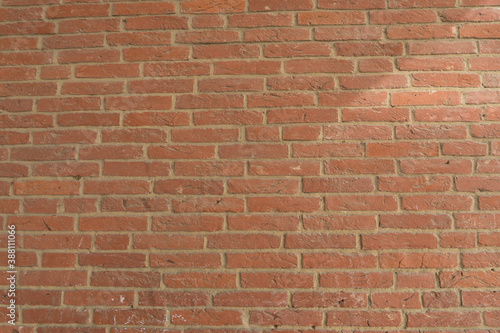 Background of old red exposed brickwork